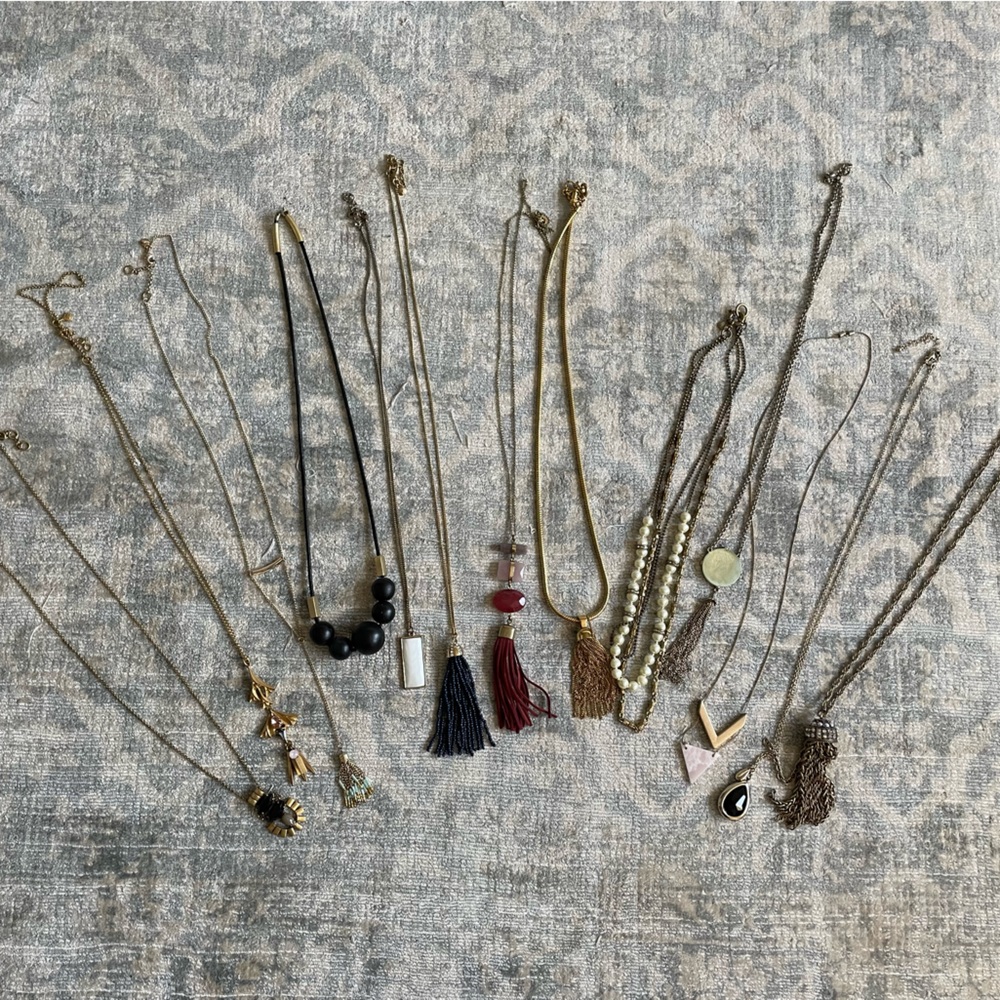 Collection of 13 long necklaces, various brands